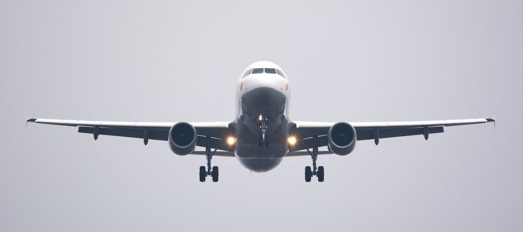 time lapse photography of white commercial airplane
